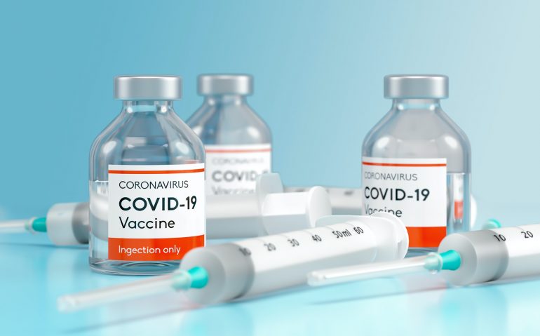 Medical Vaccine bottle vial of Covid-19 coronavirus in a research medical lab. 3D illustration