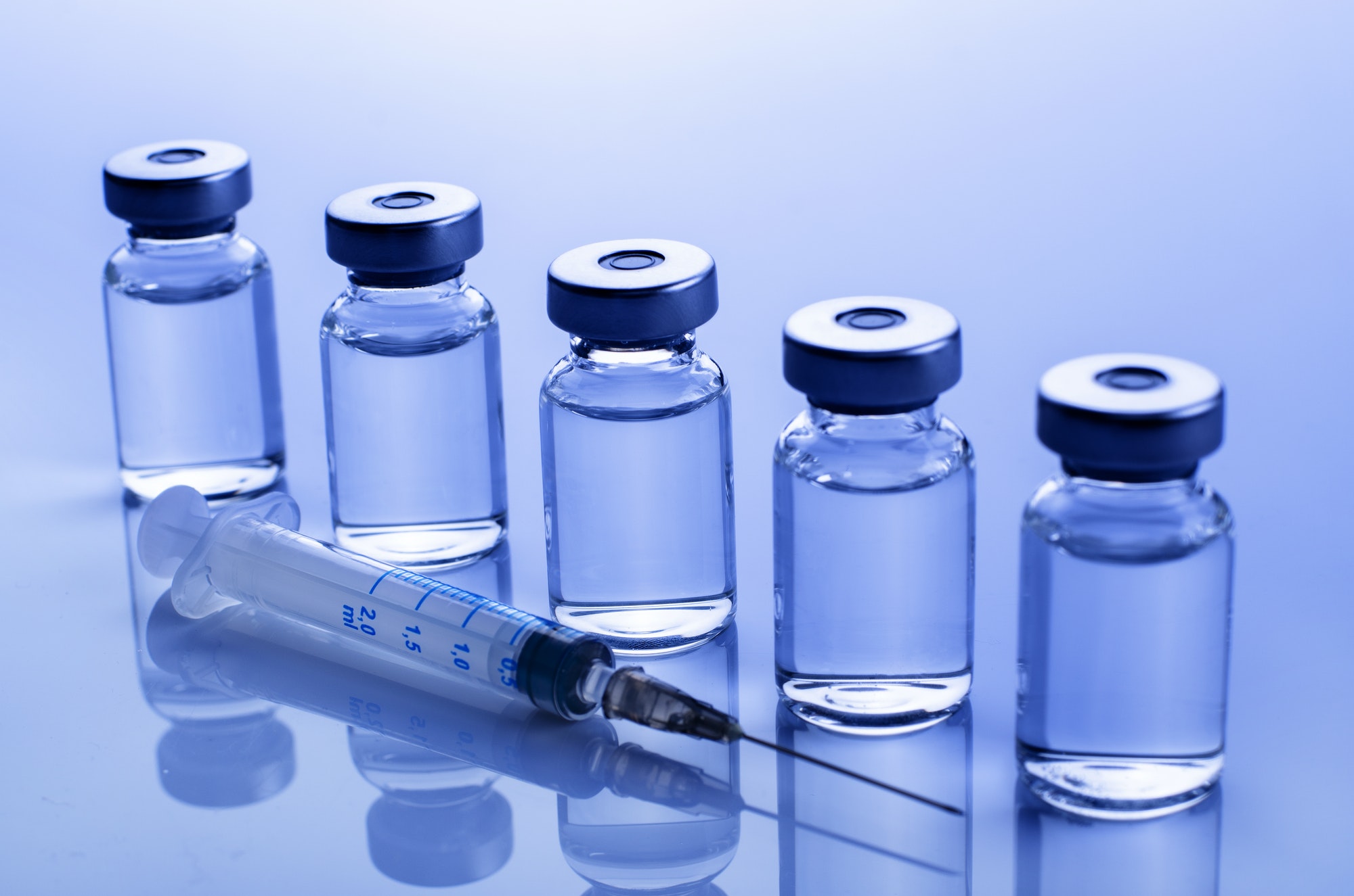 vaccine dose flu shot along with syringe